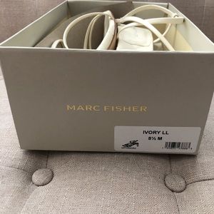 Trendy Marc Fisher white sandals